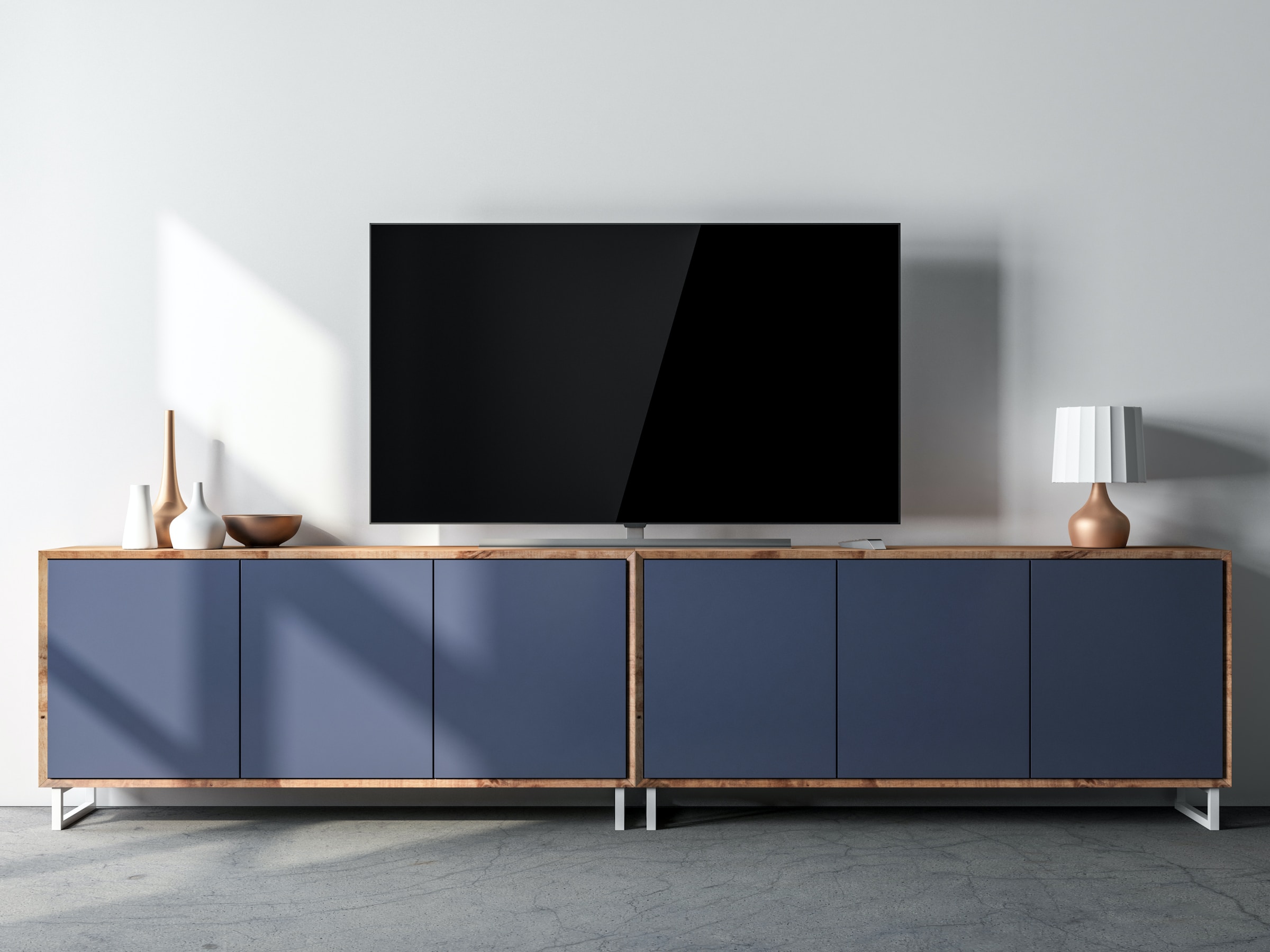 A blue tv stand with a wooden top featuring electrical safeguards.
